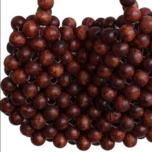 Mango wood beaded bag